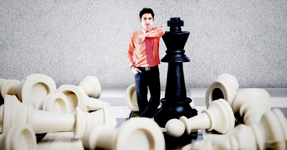 A young entrepreneur on a giant chessboard